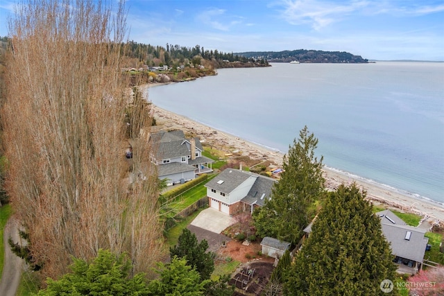 aerial view with a view of the beach and a water view