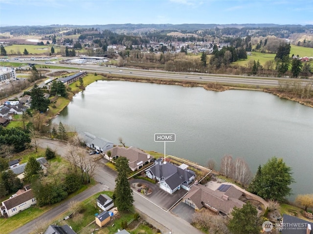 drone / aerial view featuring a water view