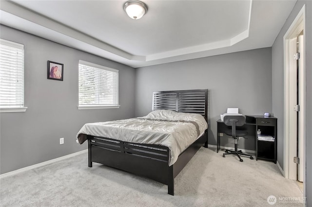 bedroom with carpet flooring and baseboards