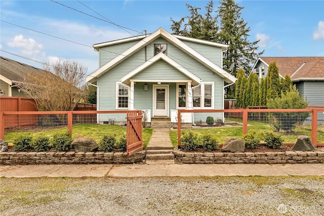 bungalow with a fenced front yard