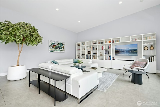 tiled bedroom featuring recessed lighting and baseboards