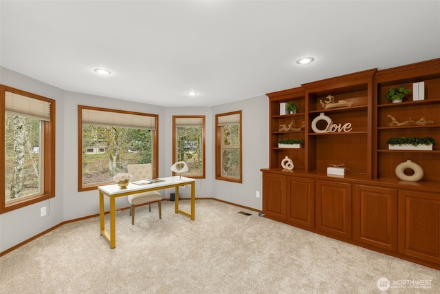 office featuring recessed lighting, light colored carpet, and baseboards