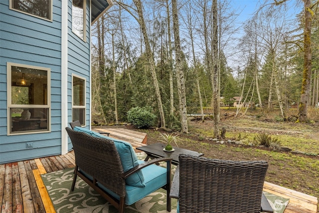 wooden deck with outdoor dining area