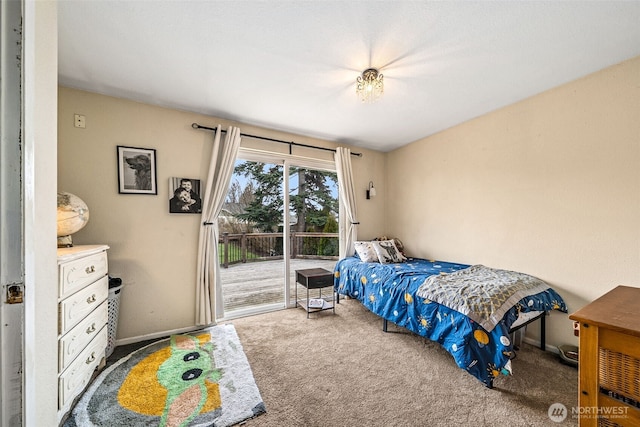 bedroom with access to exterior, baseboards, and carpet floors