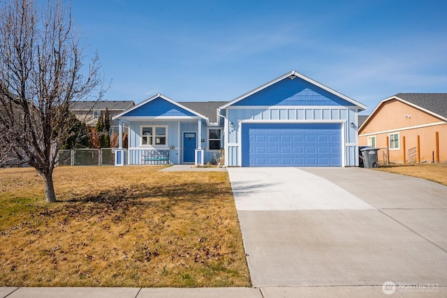 ranch-style house with fence, a porch, an attached garage, concrete driveway, and board and batten siding