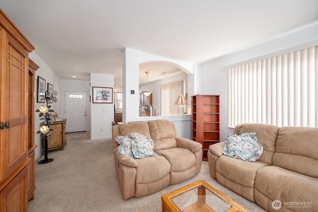 living room featuring light colored carpet