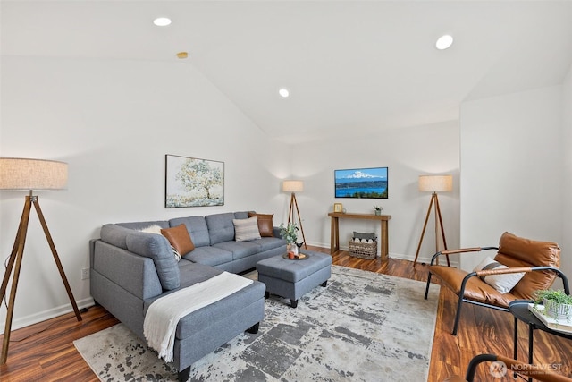 living room with lofted ceiling, recessed lighting, wood finished floors, and baseboards