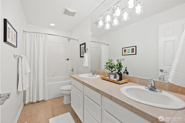 full bath featuring tile patterned floors, double vanity, visible vents, and a sink