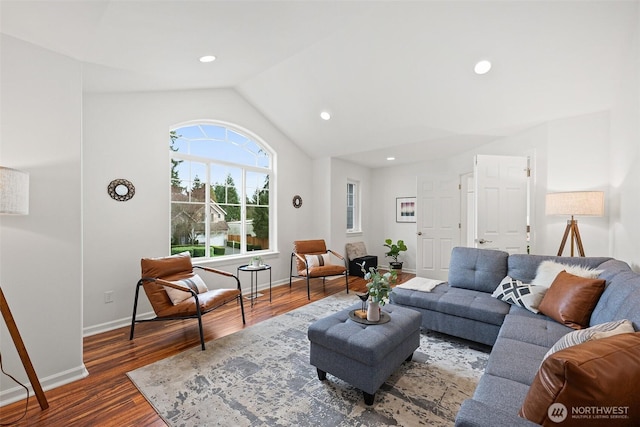 living room featuring recessed lighting, wood finished floors, baseboards, and vaulted ceiling