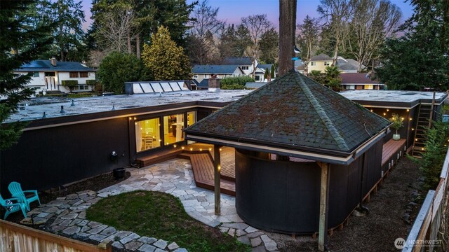 rear view of house featuring a patio area