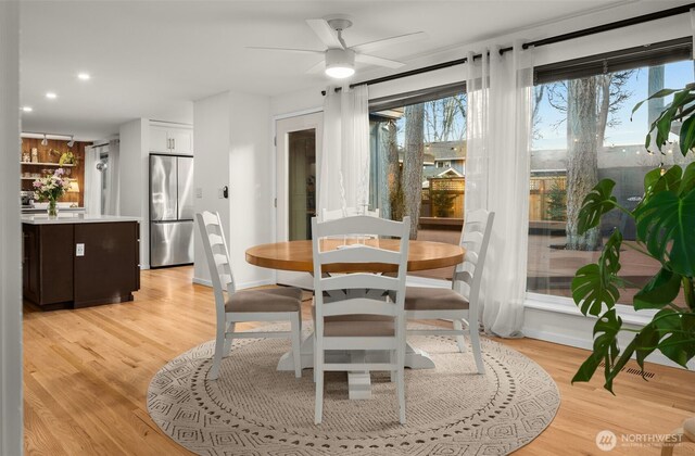 dining space with recessed lighting, baseboards, light wood-style floors, and ceiling fan