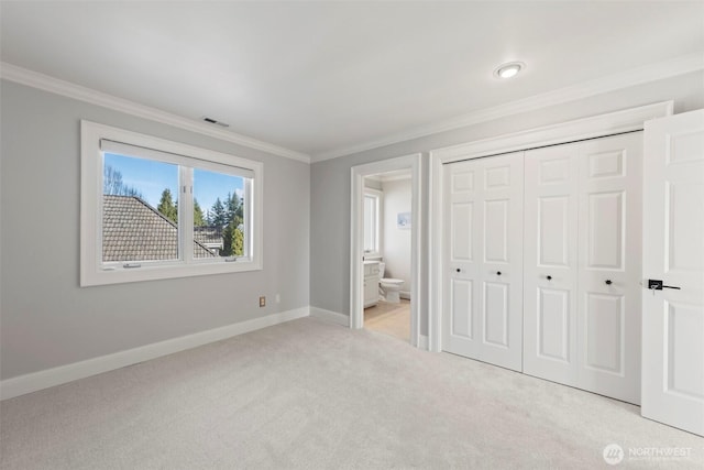 unfurnished bedroom with light carpet, visible vents, baseboards, and ornamental molding