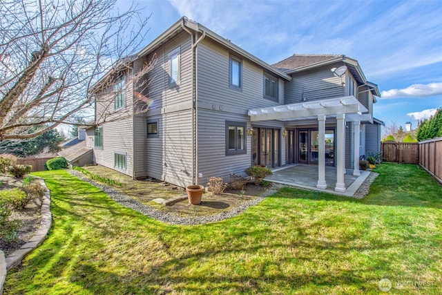 back of property featuring a lawn, a patio, a pergola, and a fenced backyard