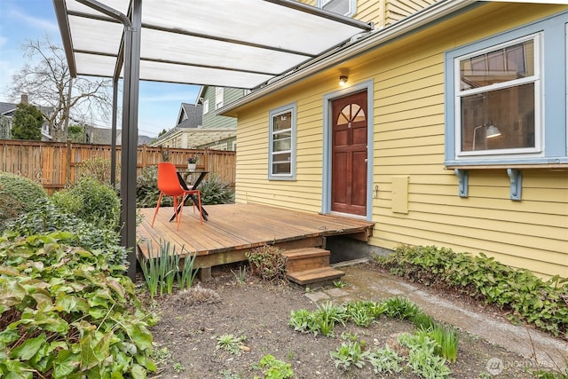 wooden deck featuring fence