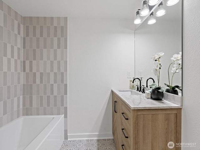 full bathroom featuring baseboards, bathing tub / shower combination, vanity, and tile patterned flooring