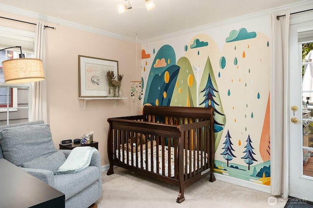 carpeted bedroom featuring baseboards and ornamental molding