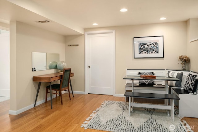 dining space with visible vents, recessed lighting, baseboards, and wood finished floors