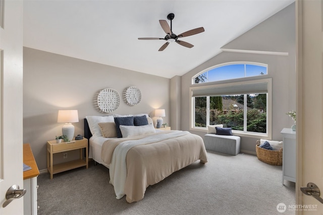 bedroom featuring lofted ceiling, baseboards, carpet floors, and ceiling fan