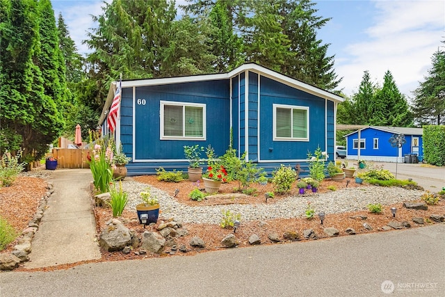 view of front of home with fence