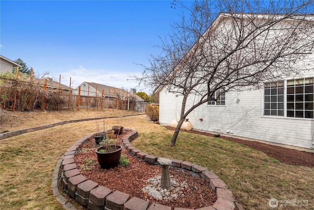 view of yard featuring fence