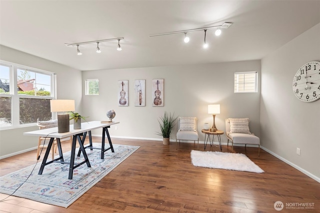 office area featuring wood finished floors and baseboards