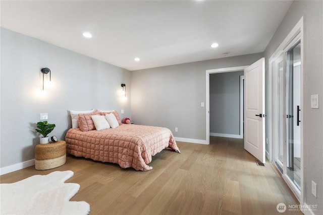 bedroom with light wood-style flooring, recessed lighting, and baseboards