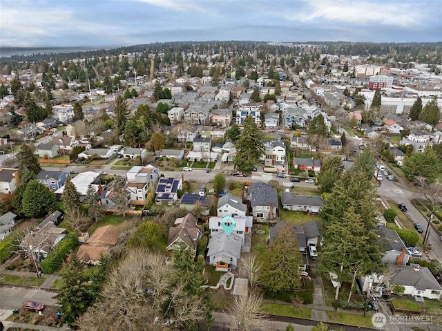 birds eye view of property with a residential view