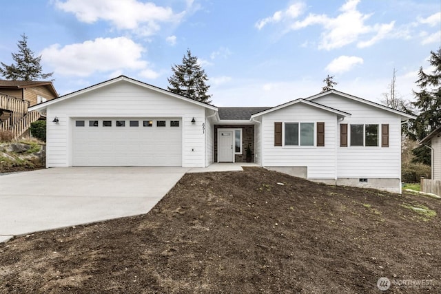 ranch-style home featuring concrete driveway and a garage