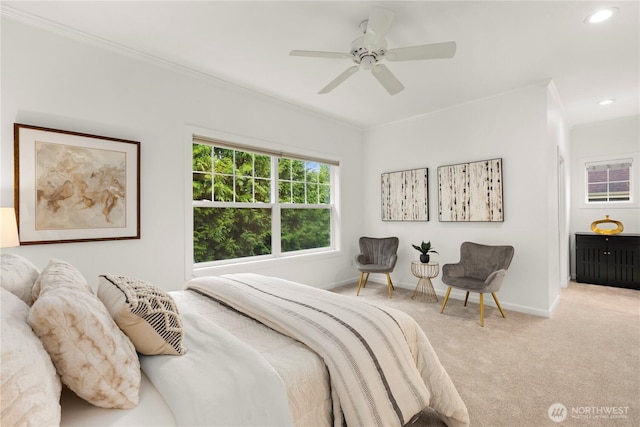 bedroom with crown molding, baseboards, carpet, ceiling fan, and recessed lighting