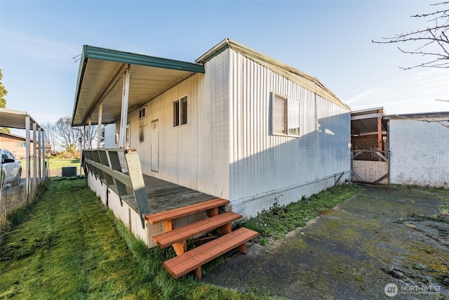 view of home's exterior with cooling unit