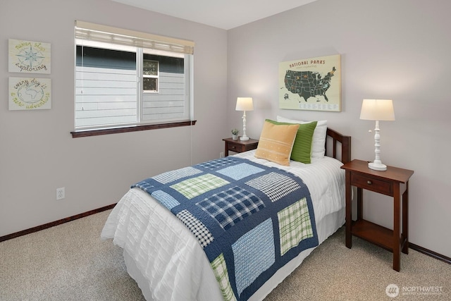 carpeted bedroom with baseboards