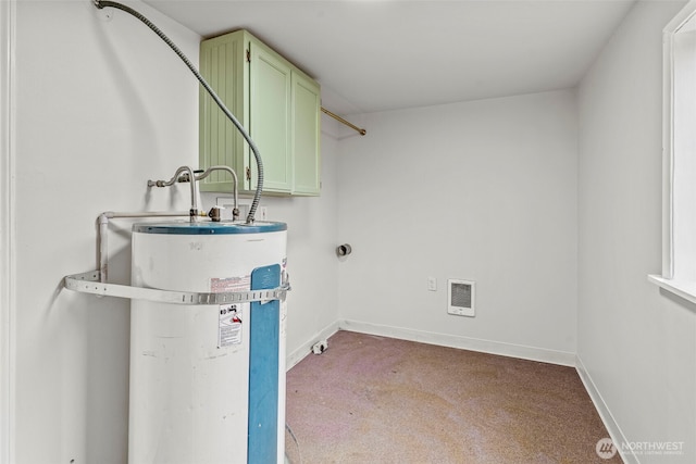 utility room with visible vents and secured water heater