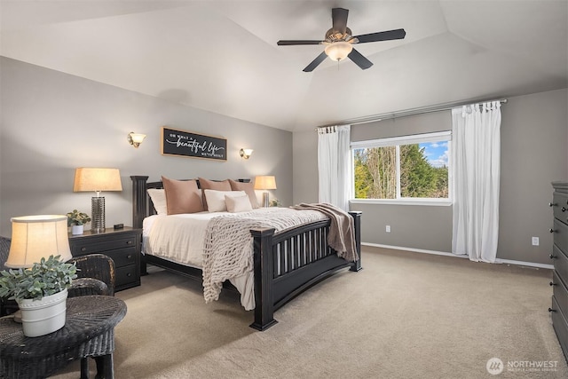 bedroom featuring ceiling fan, lofted ceiling, baseboards, and light carpet