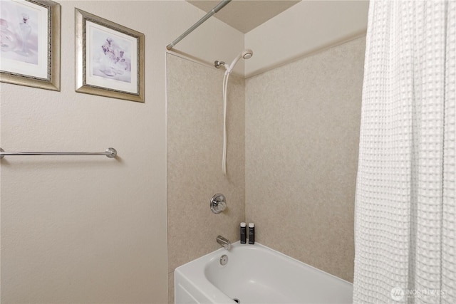 bathroom with shower / washtub combination