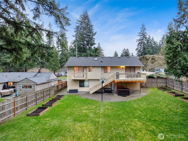 rear view of property featuring a patio area, a lawn, a fenced backyard, and a garden