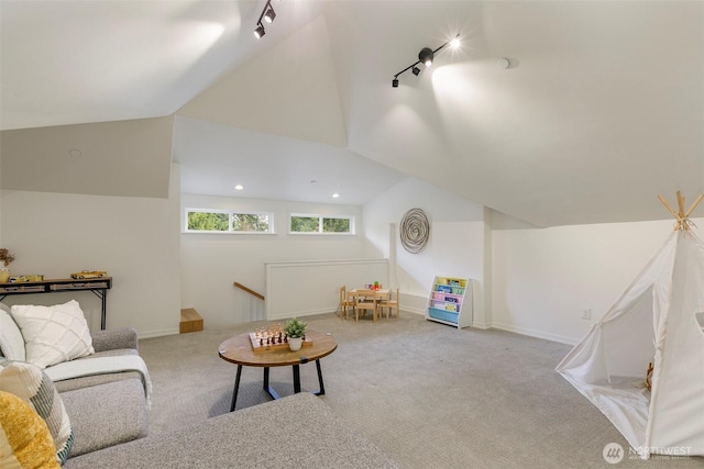 game room with high vaulted ceiling, recessed lighting, rail lighting, carpet flooring, and baseboards