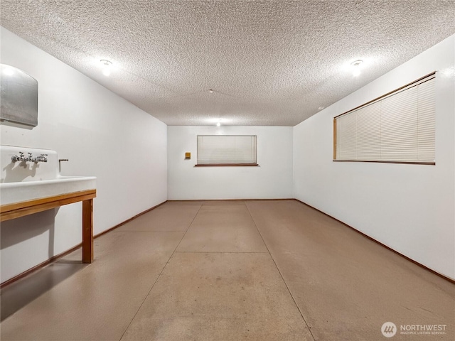 interior space featuring a textured ceiling