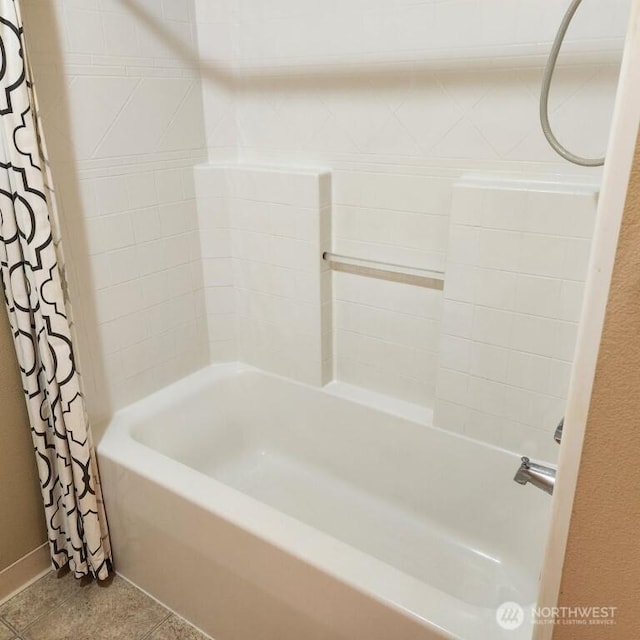 full bathroom with tile patterned flooring and shower / bath combo