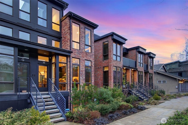 view of front of home with brick siding