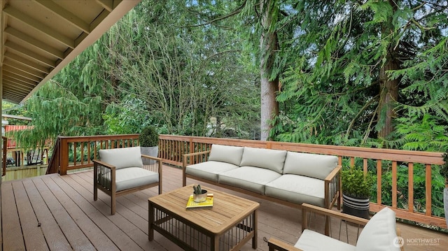 wooden deck featuring an outdoor hangout area