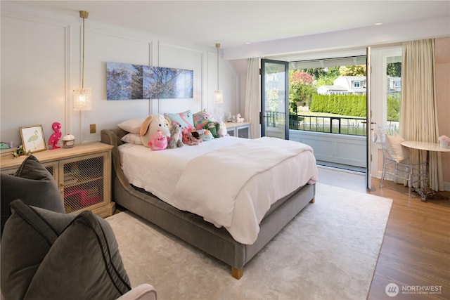 bedroom with wood finished floors