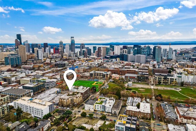 bird's eye view with a city view and a water view