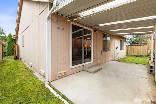 view of patio / terrace featuring fence