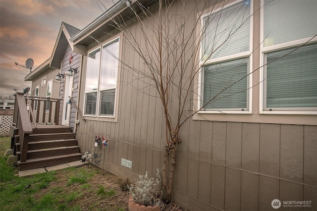 property exterior at dusk with crawl space