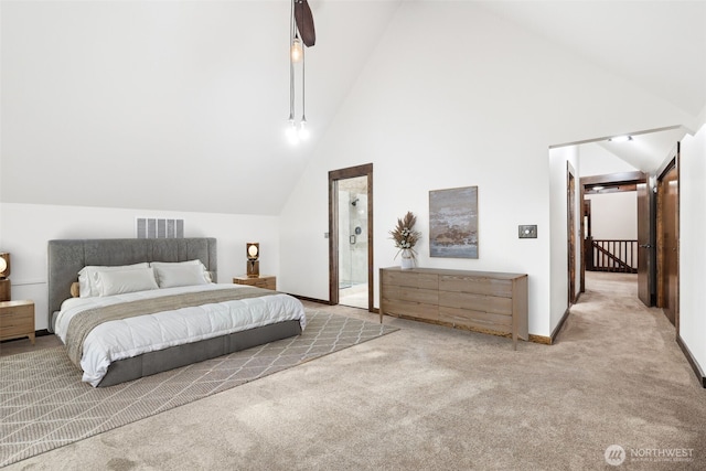 carpeted bedroom featuring baseboards, visible vents, and high vaulted ceiling