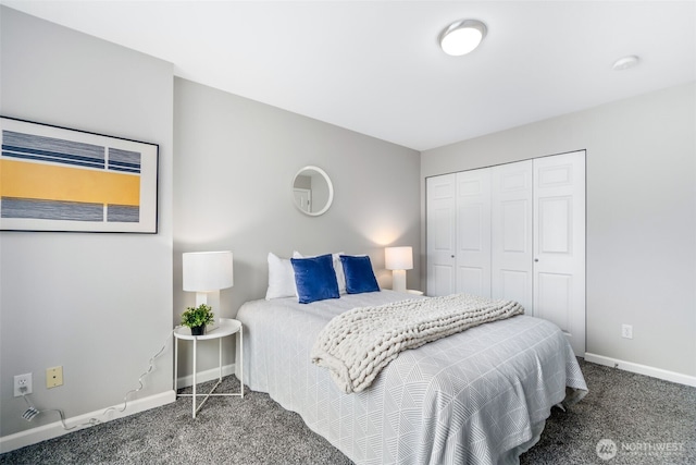 carpeted bedroom with baseboards and a closet