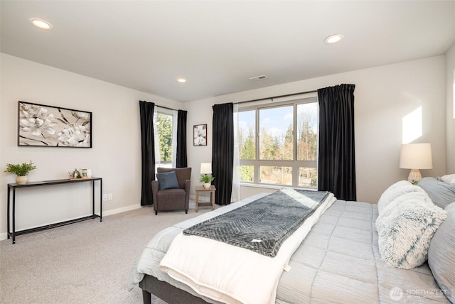 bedroom with recessed lighting, visible vents, carpet floors, and baseboards