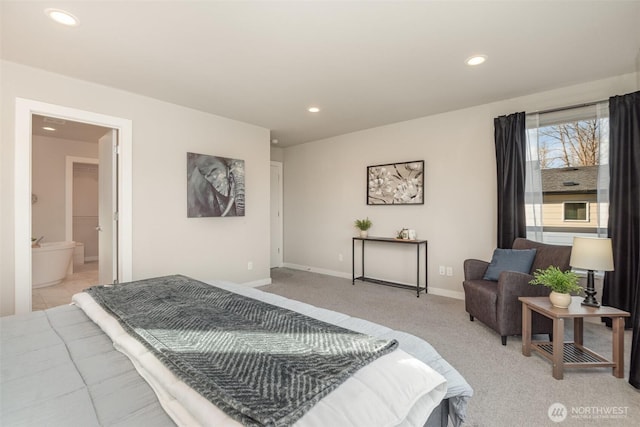 bedroom featuring recessed lighting, light colored carpet, and baseboards