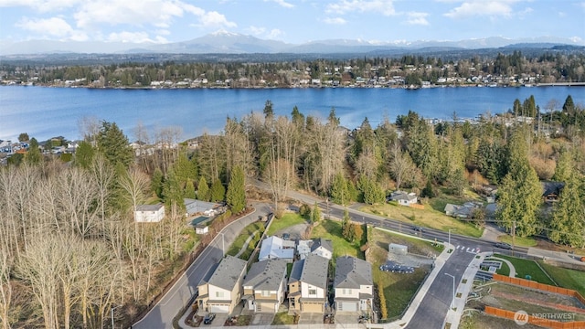 bird's eye view featuring a water and mountain view