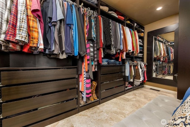 walk in closet featuring visible vents